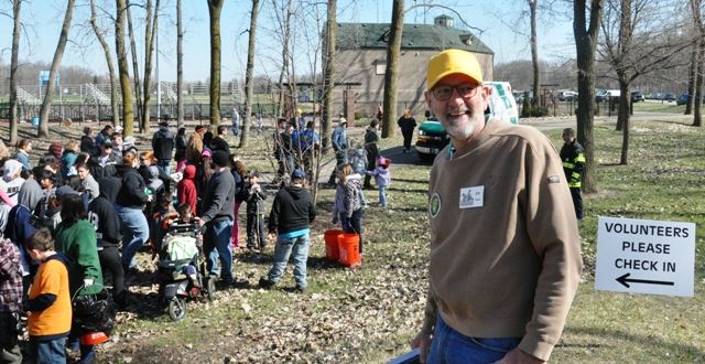 A helper posing for a picture